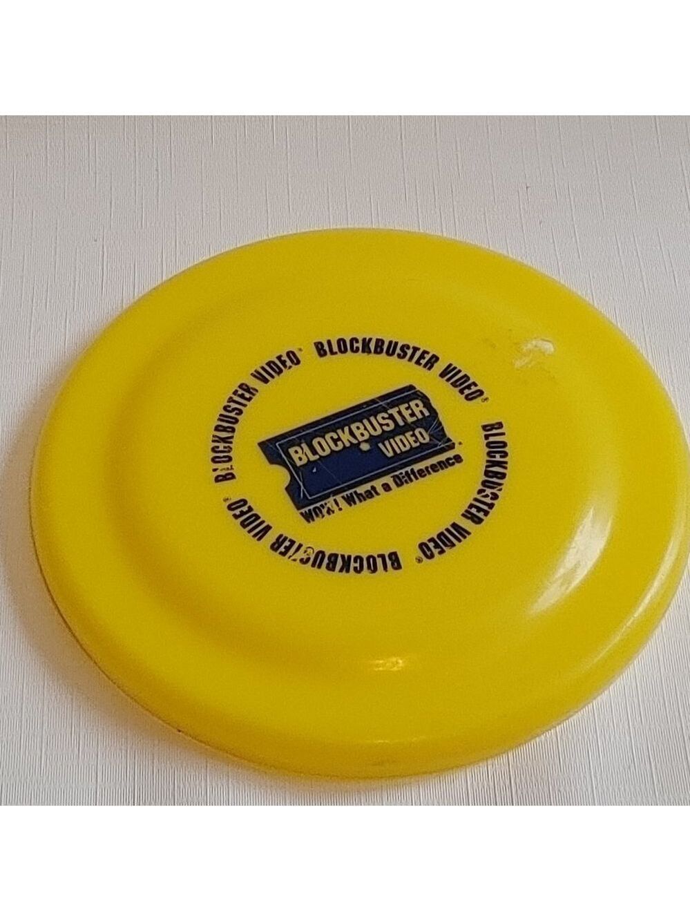 VINTAGE BLOCKBUSTER VIDEO Frisbee BRIGHT